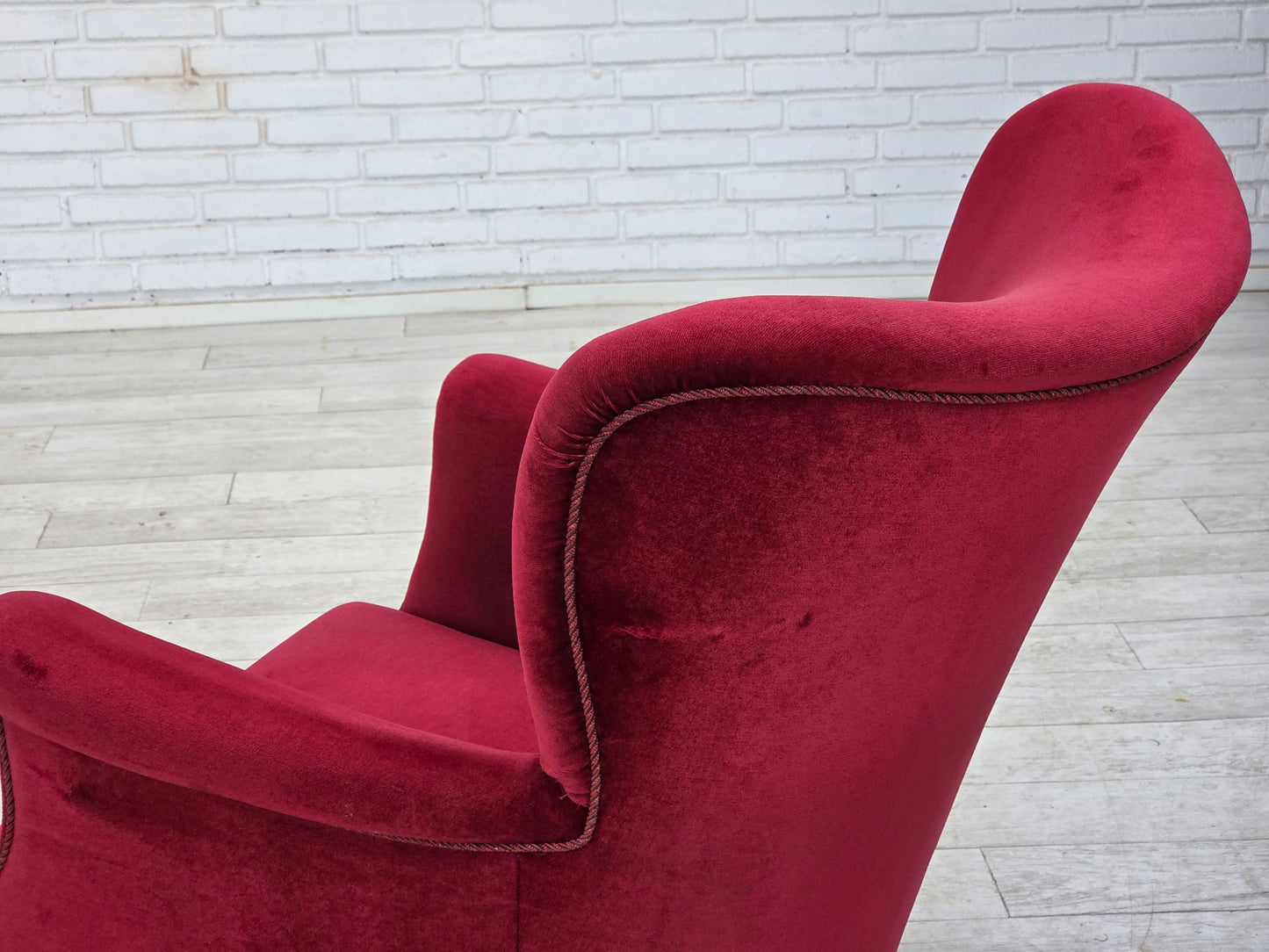 1970s, Danish armchair, cherry-red furniture velour, oak wood legs.