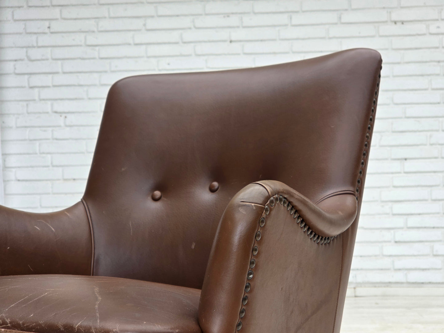 1960s, Danish armchair, furniture leather, ash wood legs.