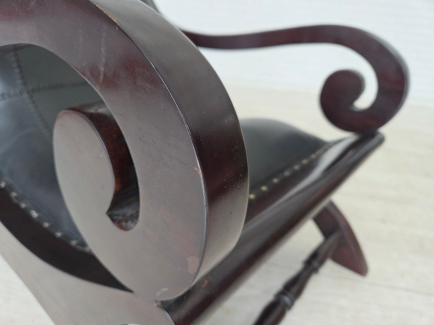 1970s, vintage armchair with footstool, black furniture leather.