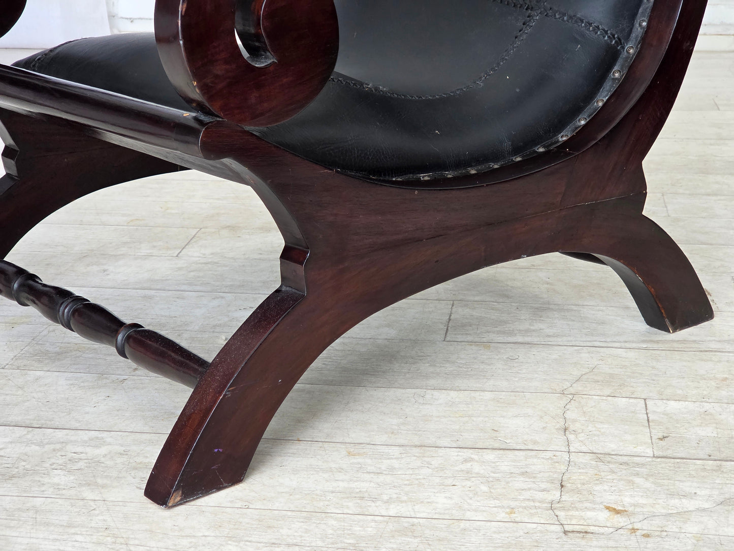 1970s, vintage armchair with footstool, black furniture leather.