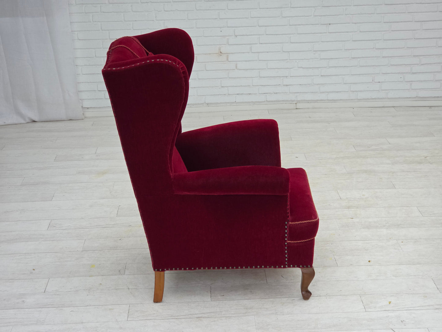 1960s, Danish highback wingback armchair, cherry-red furniture velour.