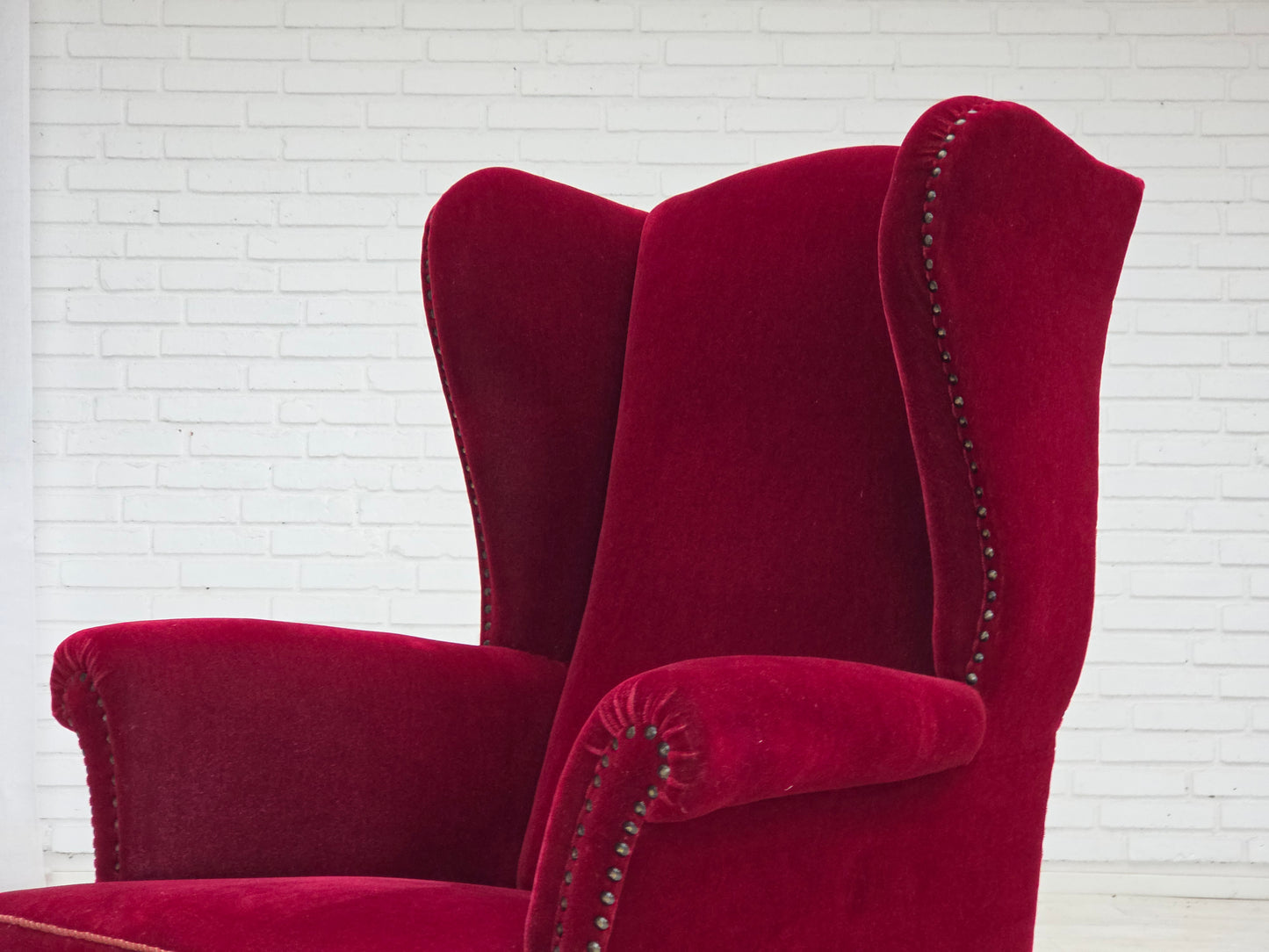 1960s, Danish highback wingback armchair, cherry-red furniture velour.