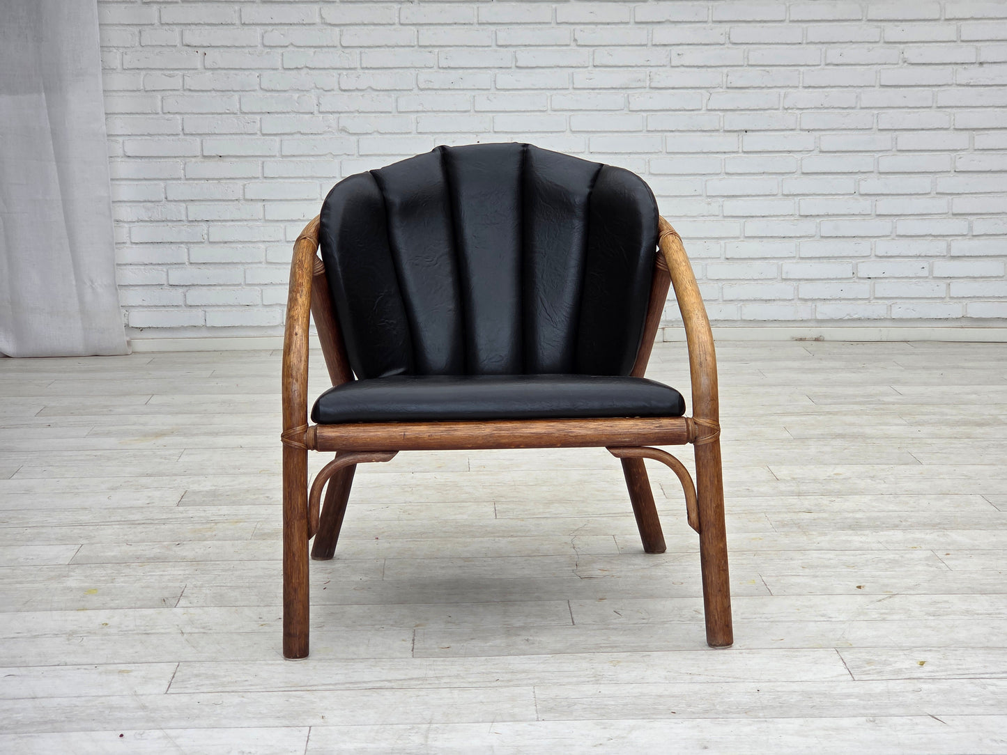 1970s, Danish armchair, rattan, black artificial leather.