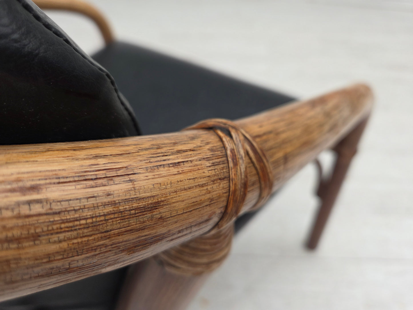 1970s, Danish armchair, rattan, black artificial leather.