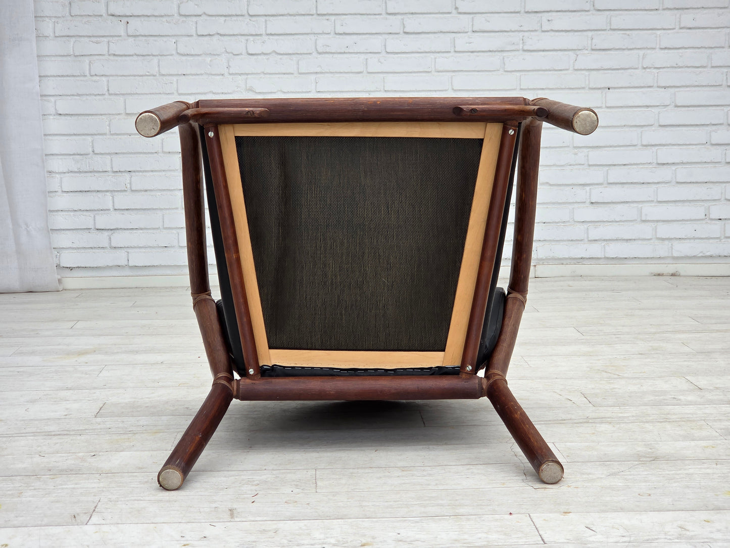 1970s, Danish armchair, rattan, black artificial leather.