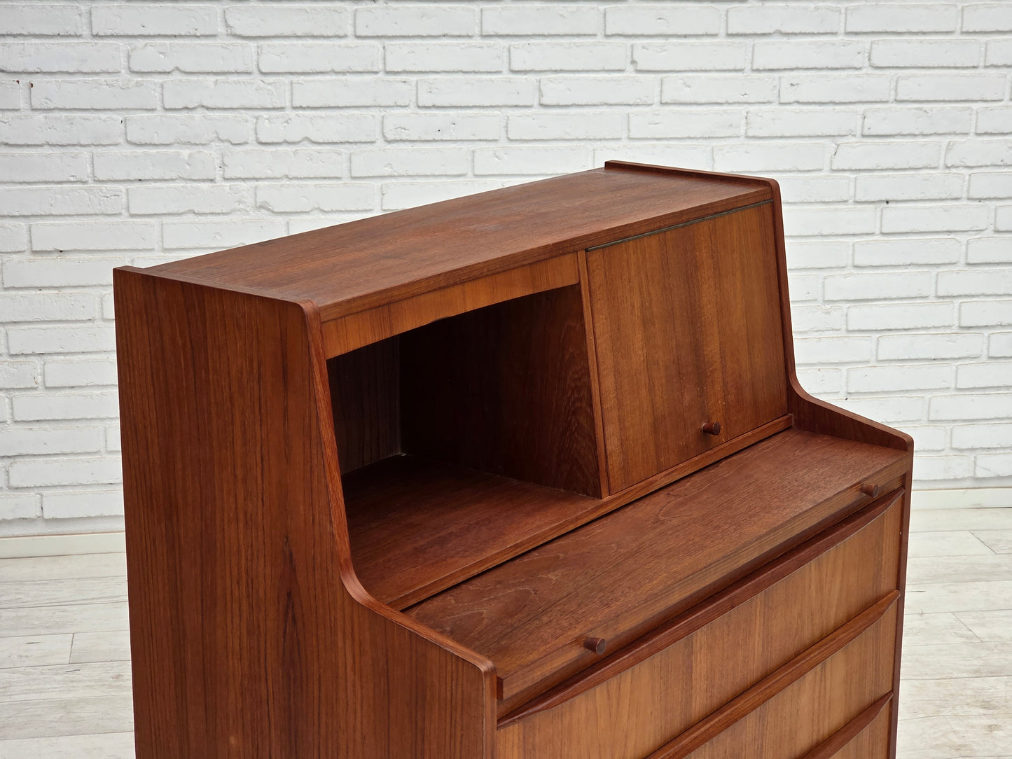 1970s, Danish chest of drawers with a folding mirror, teak wood.