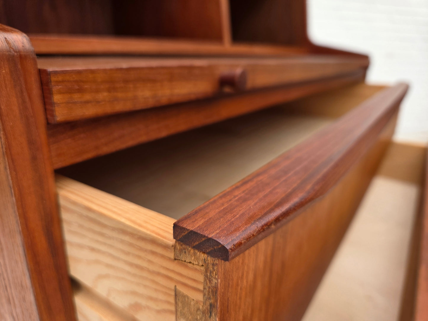 1970s, Danish chest of drawers with a folding mirror, teak wood.