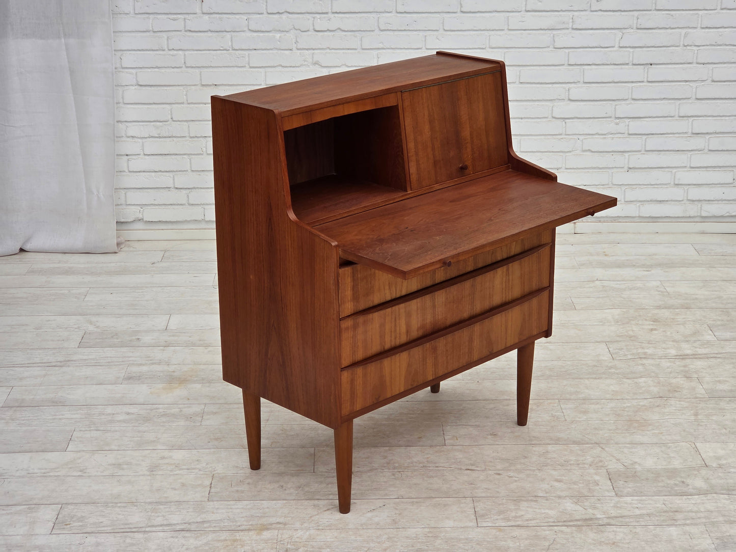 1970s, Danish chest of drawers with a folding mirror, teak wood.