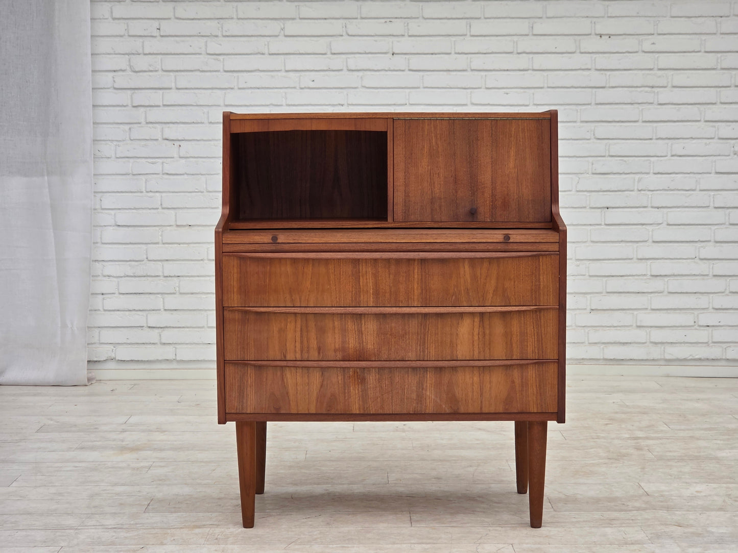 1970s, Danish chest of drawers with a folding mirror, teak wood.