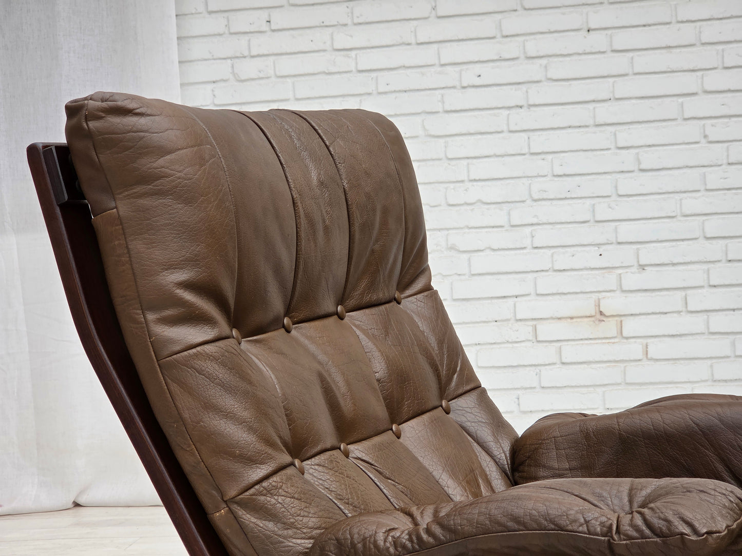 1970s, Scandinavian design, armchair in brown furniture leather.