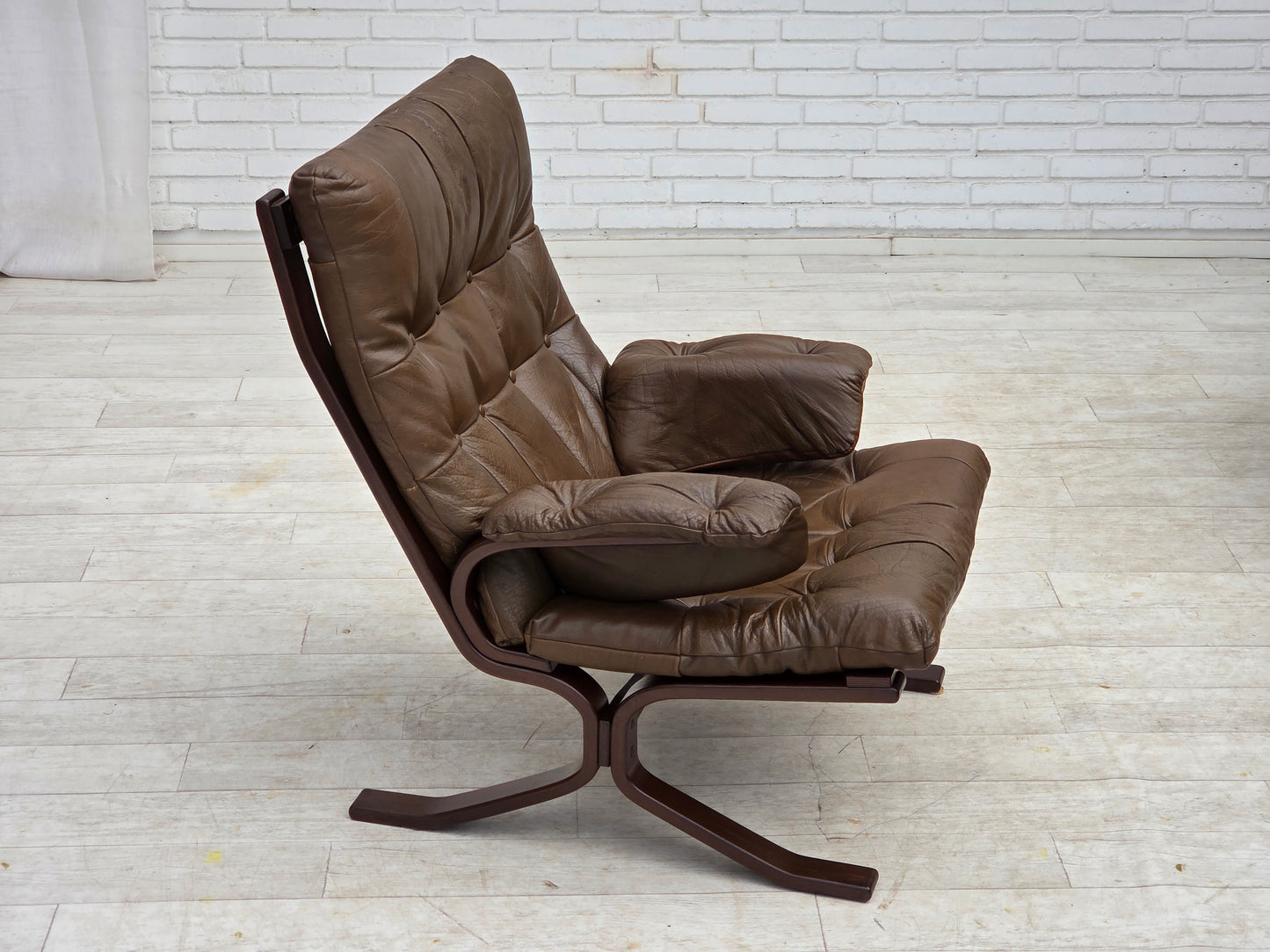 1970s, Scandinavian design, armchair in brown furniture leather.
