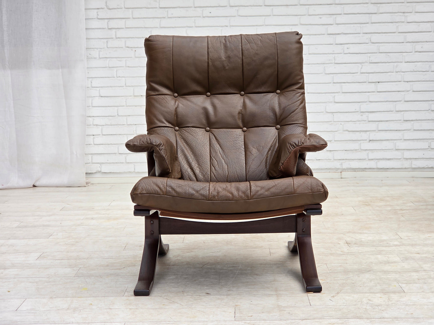 1970s, Scandinavian design, armchair in brown furniture leather.