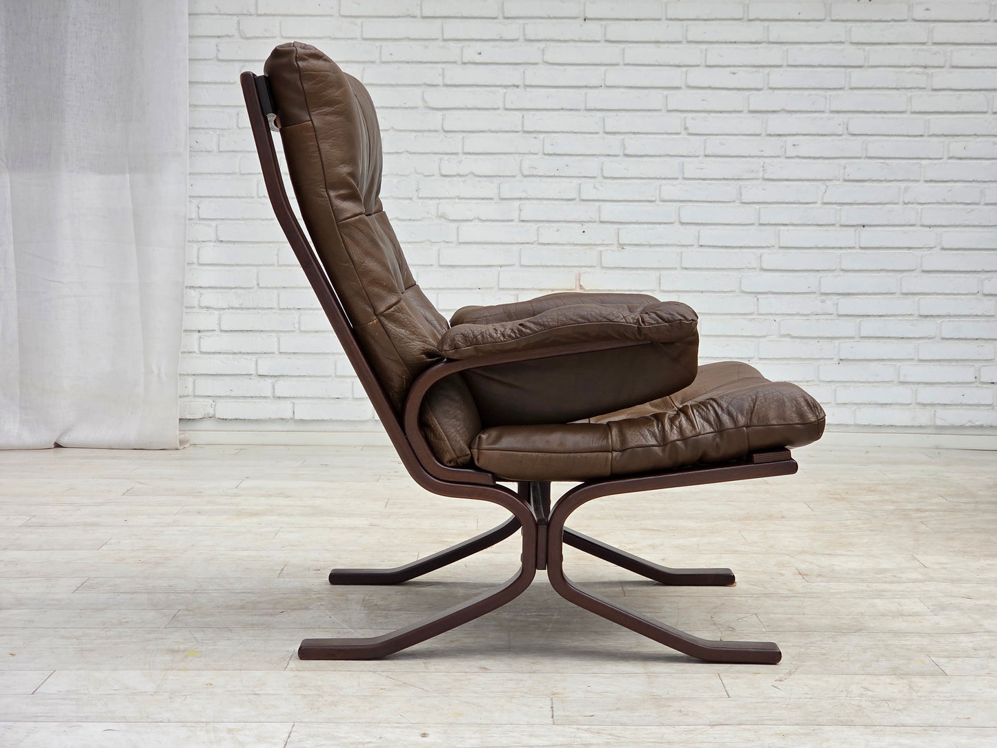 1970s, Scandinavian design, armchair in brown furniture leather.