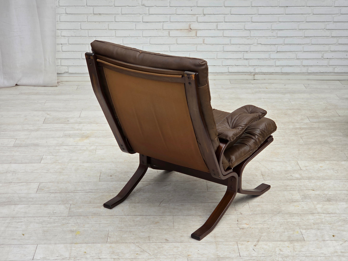1970s, Scandinavian design, armchair in brown furniture leather.