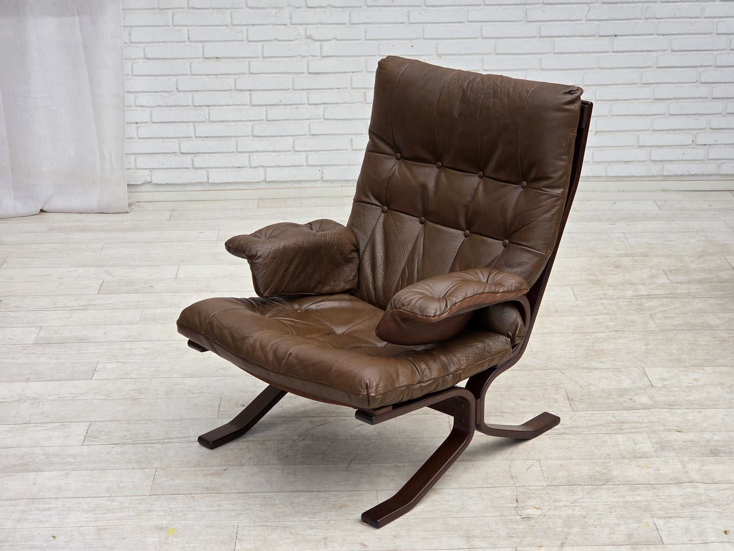 1970s, Scandinavian design, armchair in brown furniture leather.