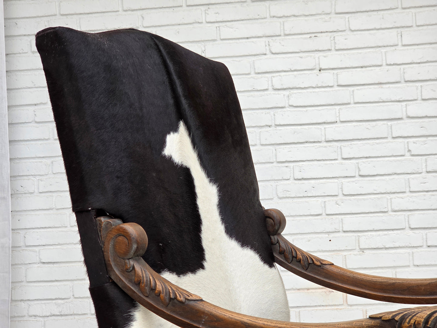1950s, Danish highback armchair, genuine cowhide, oak wood.