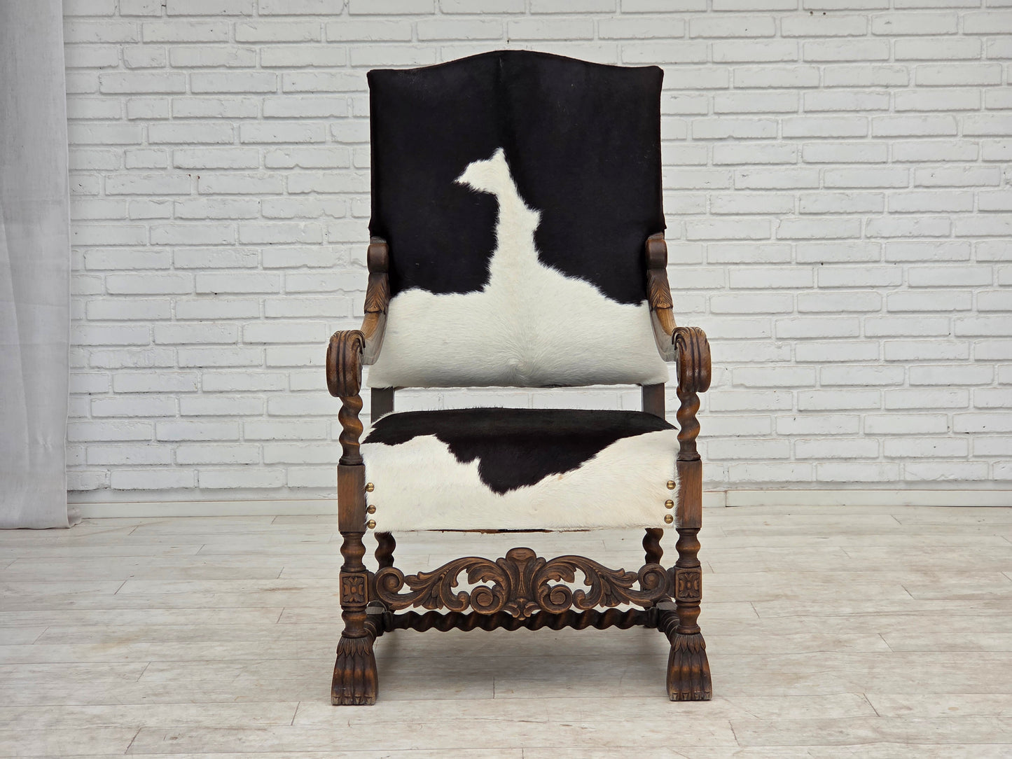 1950s, Danish highback armchair, genuine cowhide, oak wood.