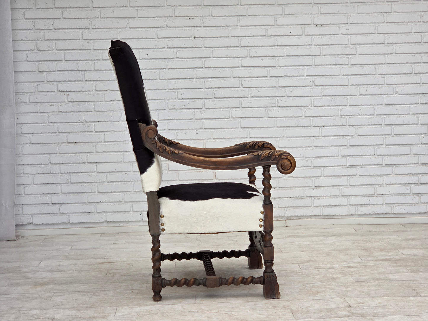 1950s, Danish highback armchair, genuine cowhide, oak wood.