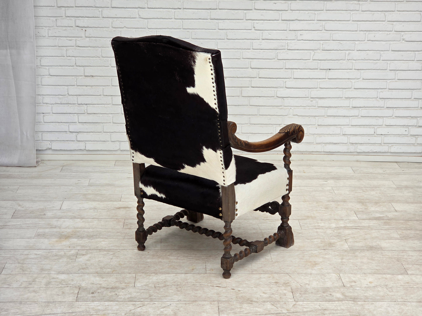 1950s, Danish highback armchair, genuine cowhide, oak wood.