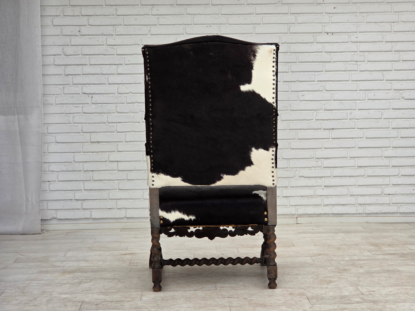 1950s, Danish highback armchair, genuine cowhide, oak wood.