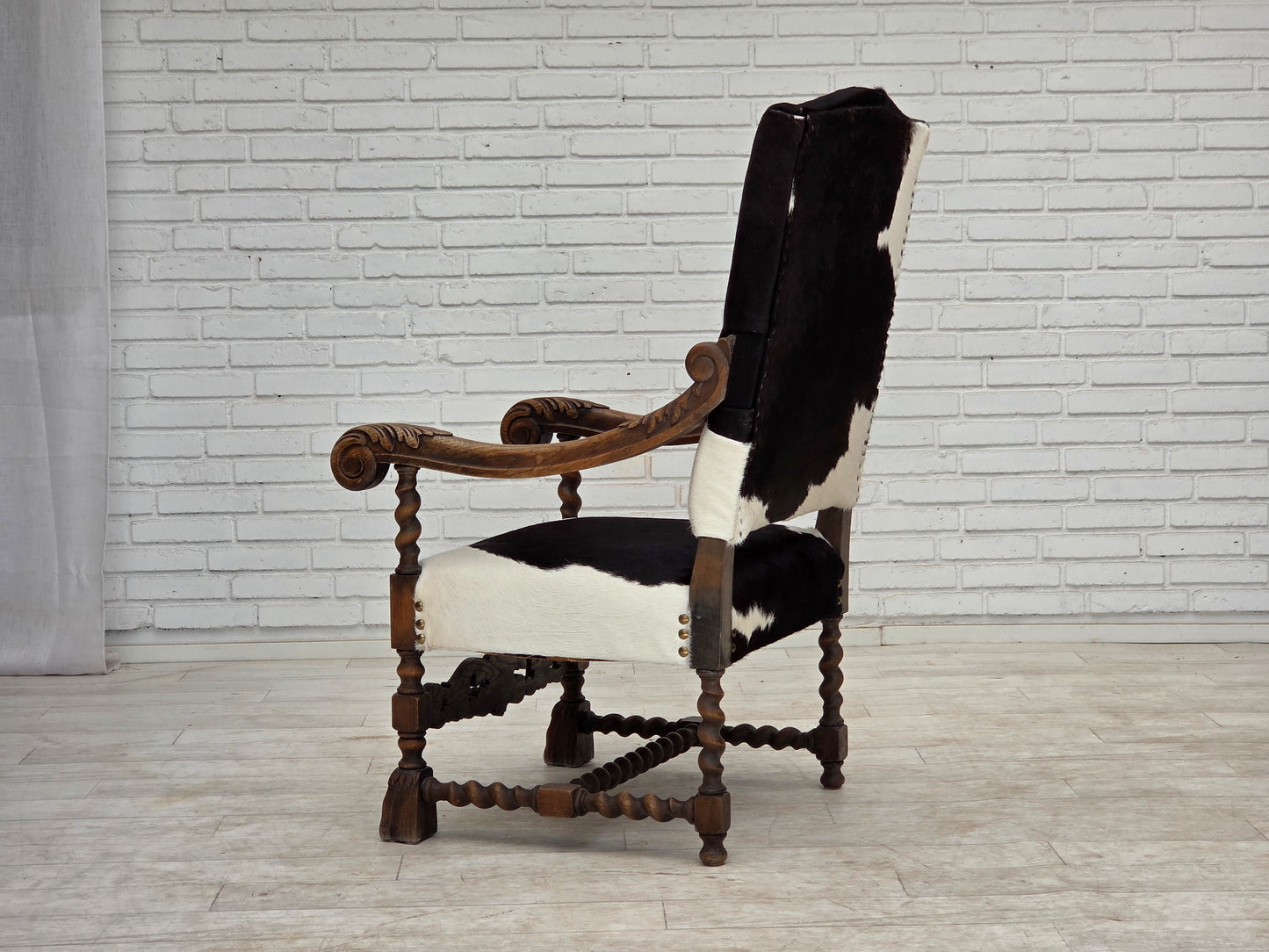 1950s, Danish highback armchair, genuine cowhide, oak wood.