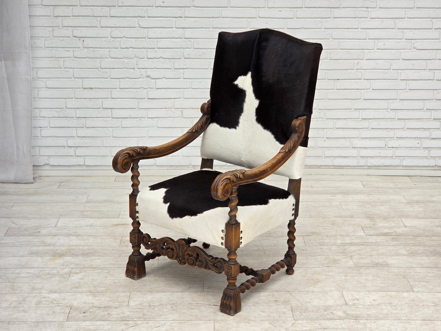 1950s, Danish highback armchair, genuine cowhide, oak wood.