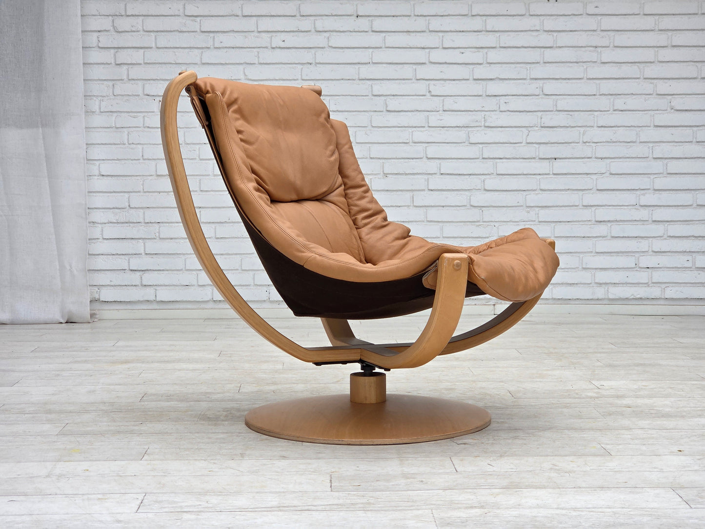 1980s, Scandinavian swivel armchair, furniture leather, bent wood.