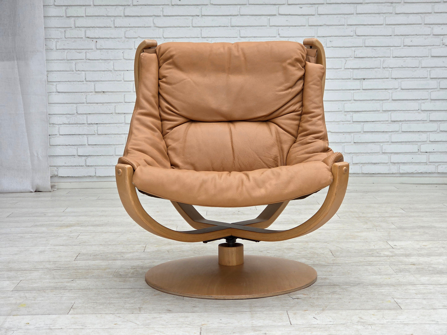1980s, Scandinavian swivel armchair, furniture leather, bent wood.