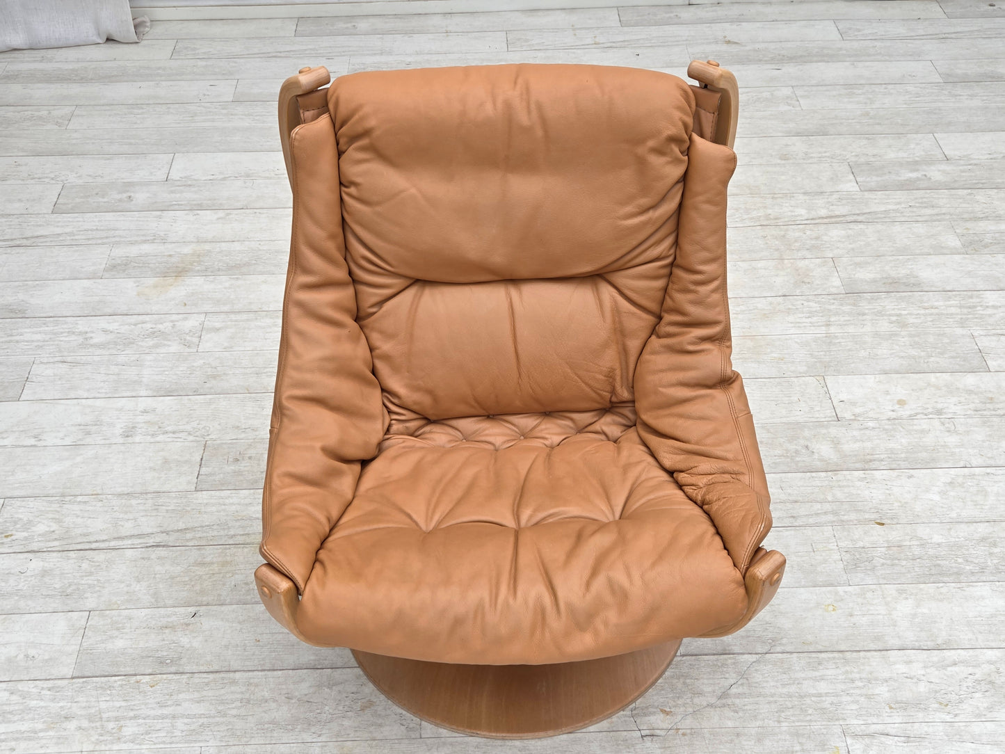 1980s, Scandinavian swivel armchair, furniture leather, bent wood.