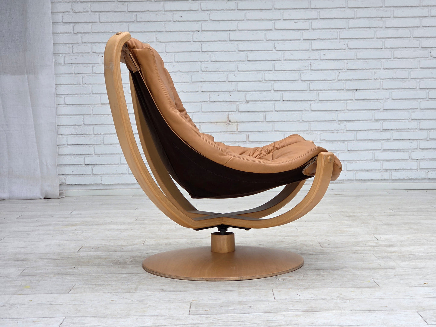 1980s, Scandinavian swivel armchair, furniture leather, bent wood.