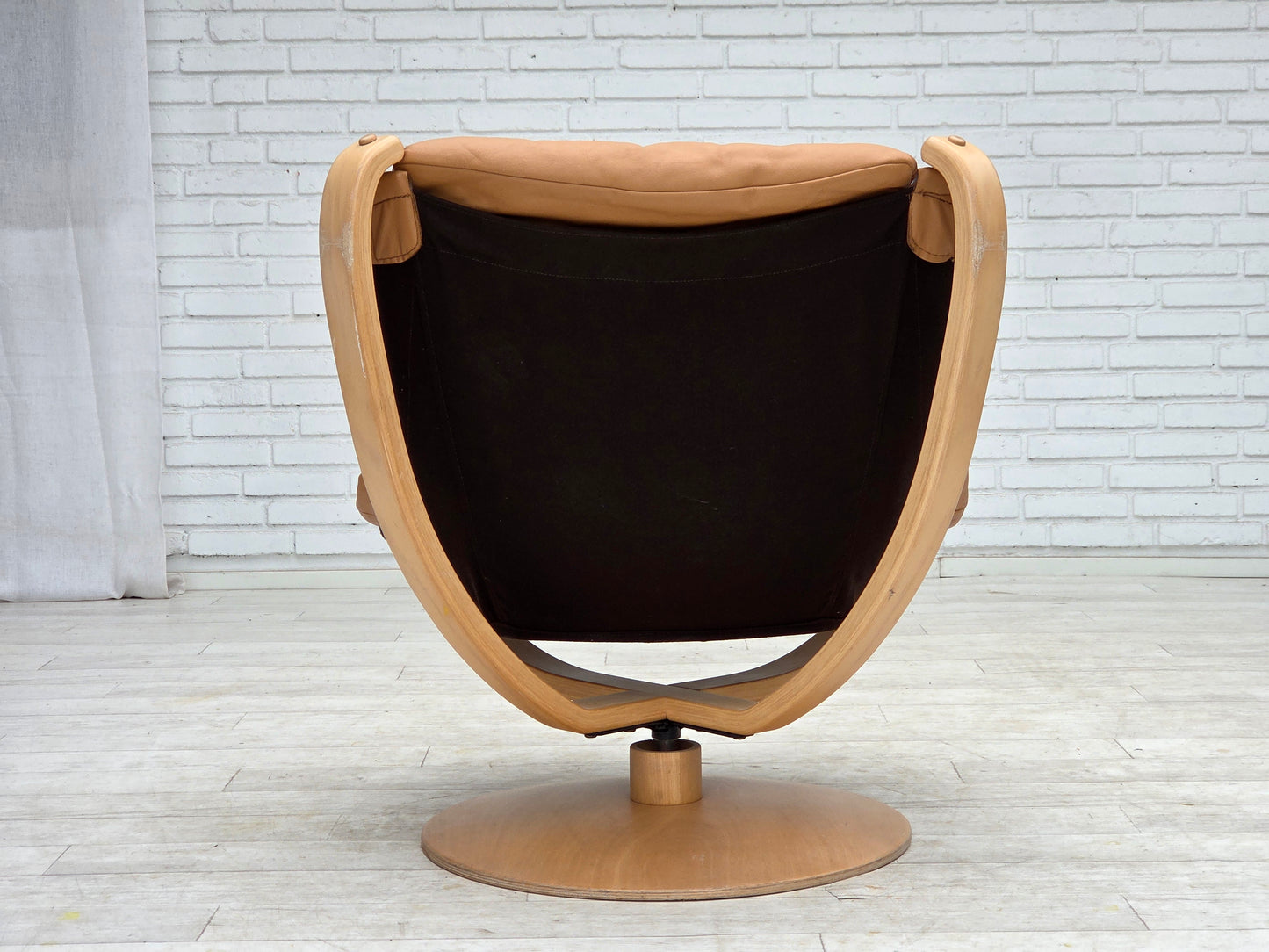 1980s, Scandinavian swivel armchair, furniture leather, bent wood.