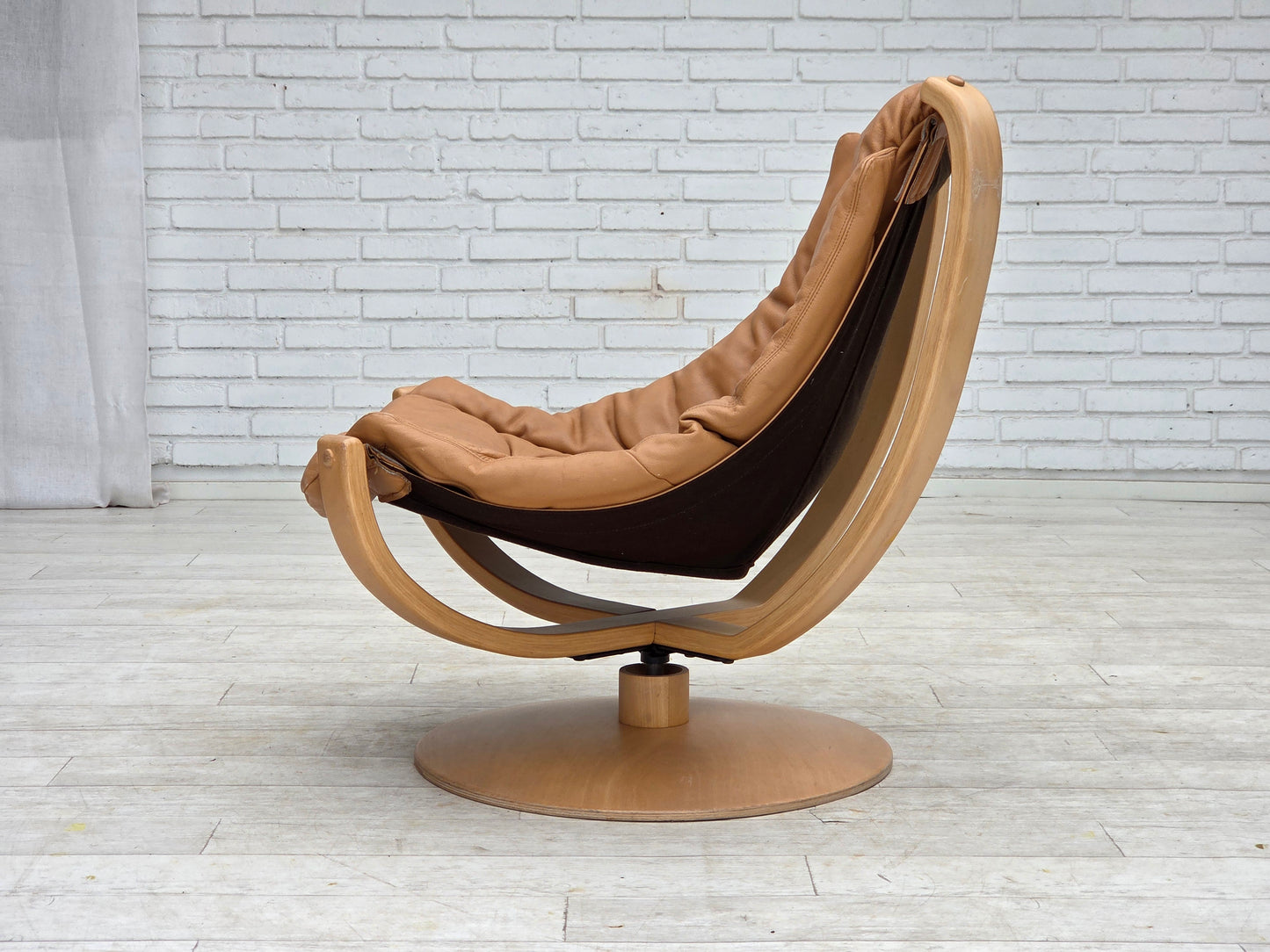 1980s, Scandinavian swivel armchair, furniture leather, bent wood.