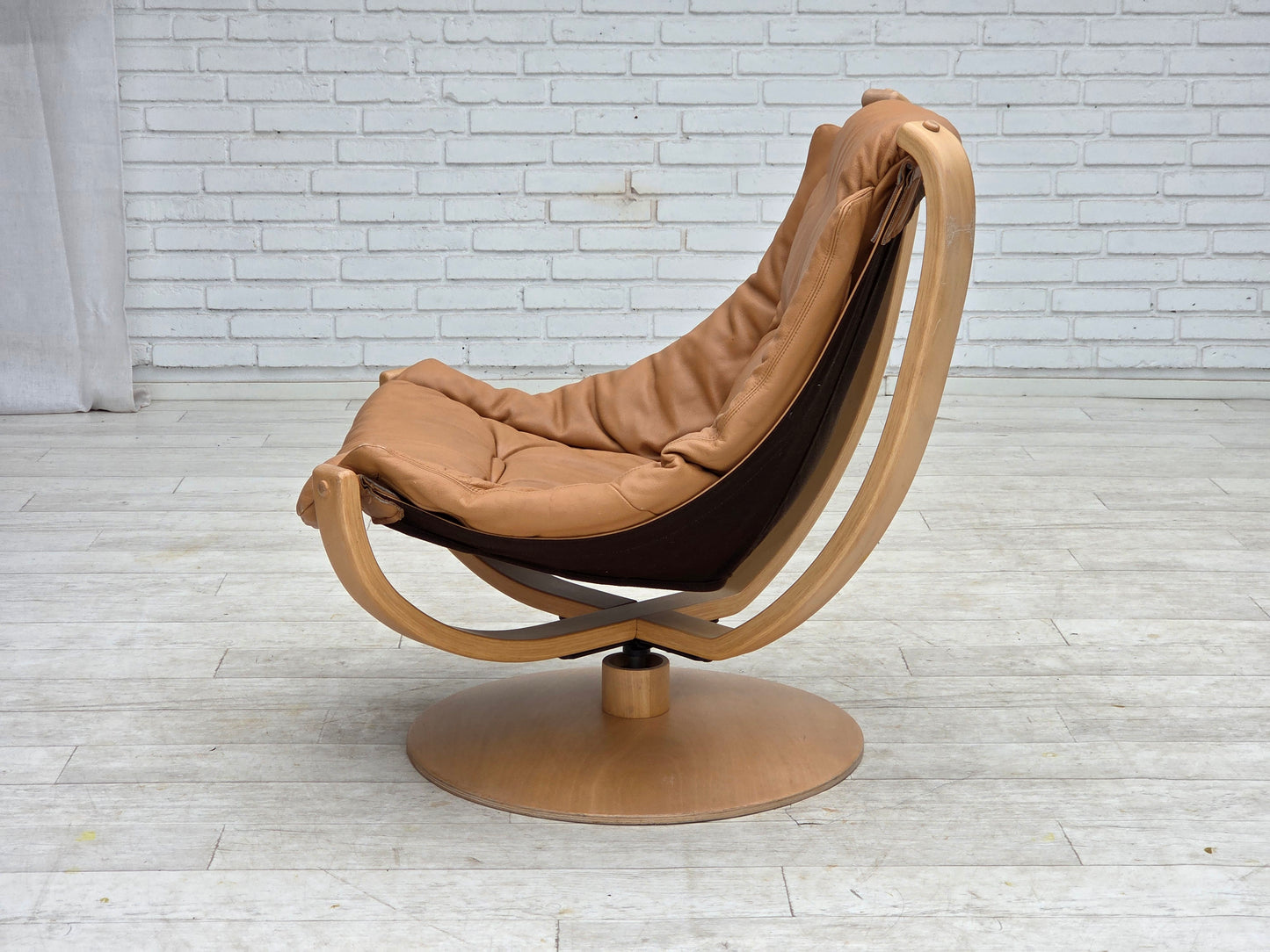 1980s, Scandinavian swivel armchair, furniture leather, bent wood.