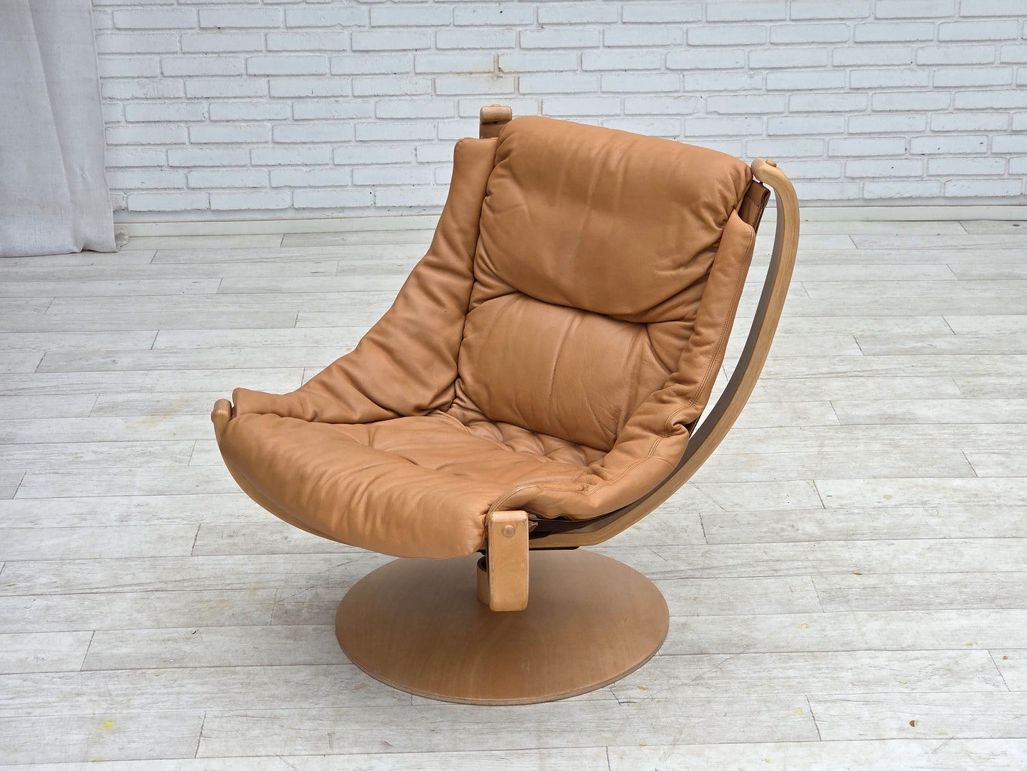 1980s, Scandinavian swivel armchair, furniture leather, bent wood.