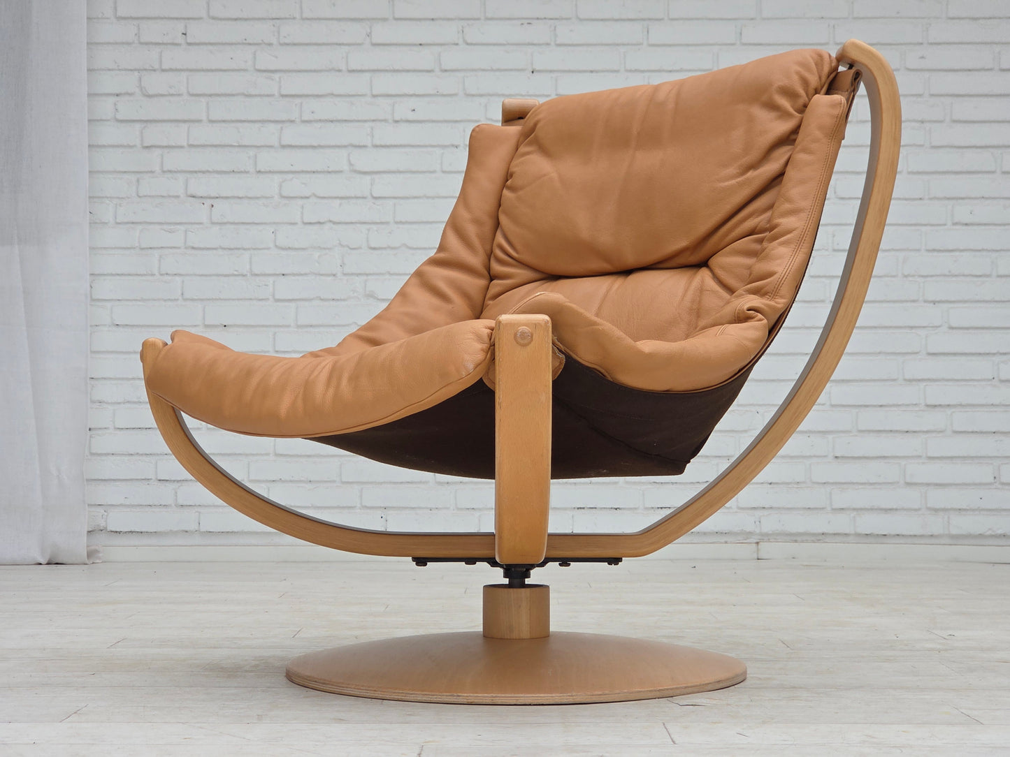 1980s, Scandinavian swivel armchair, furniture leather, bent wood.