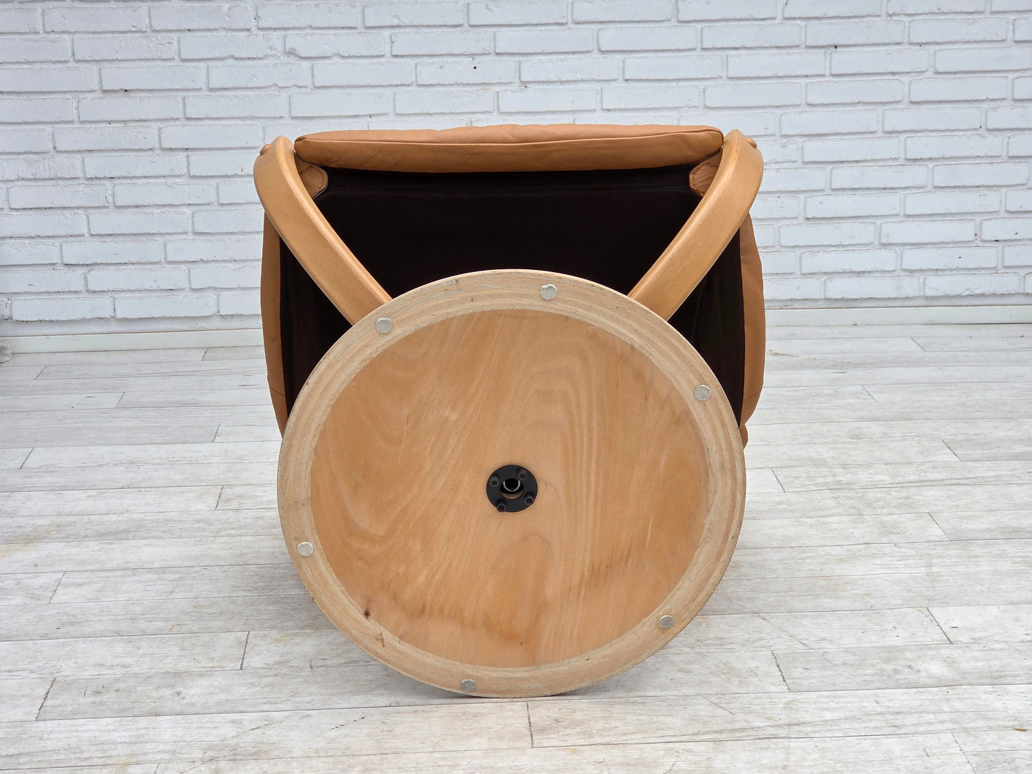 1980s, Scandinavian swivel armchair, furniture leather, bent wood.