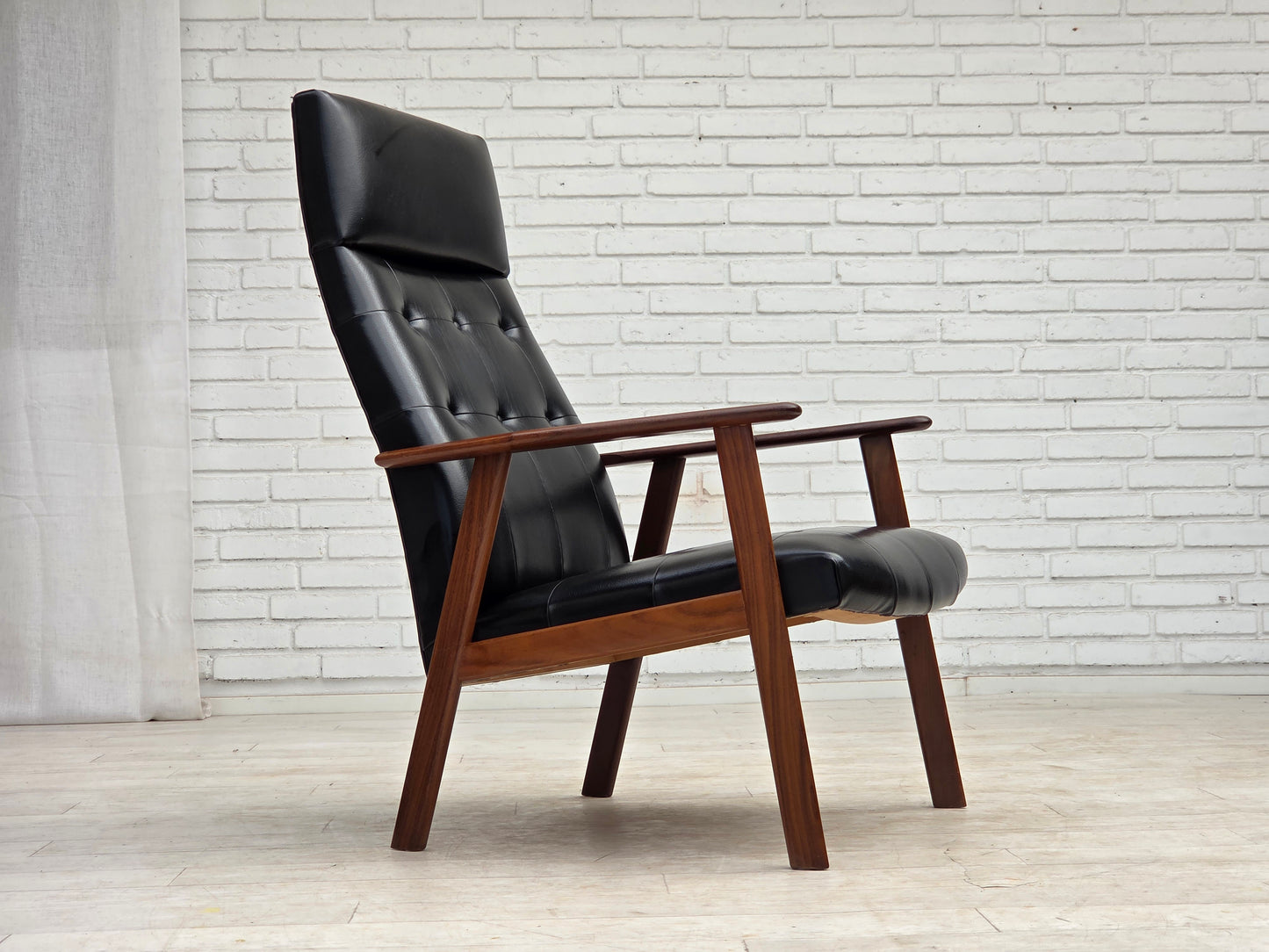 1970s, Danish armchair, black artificial leather, teak wood.