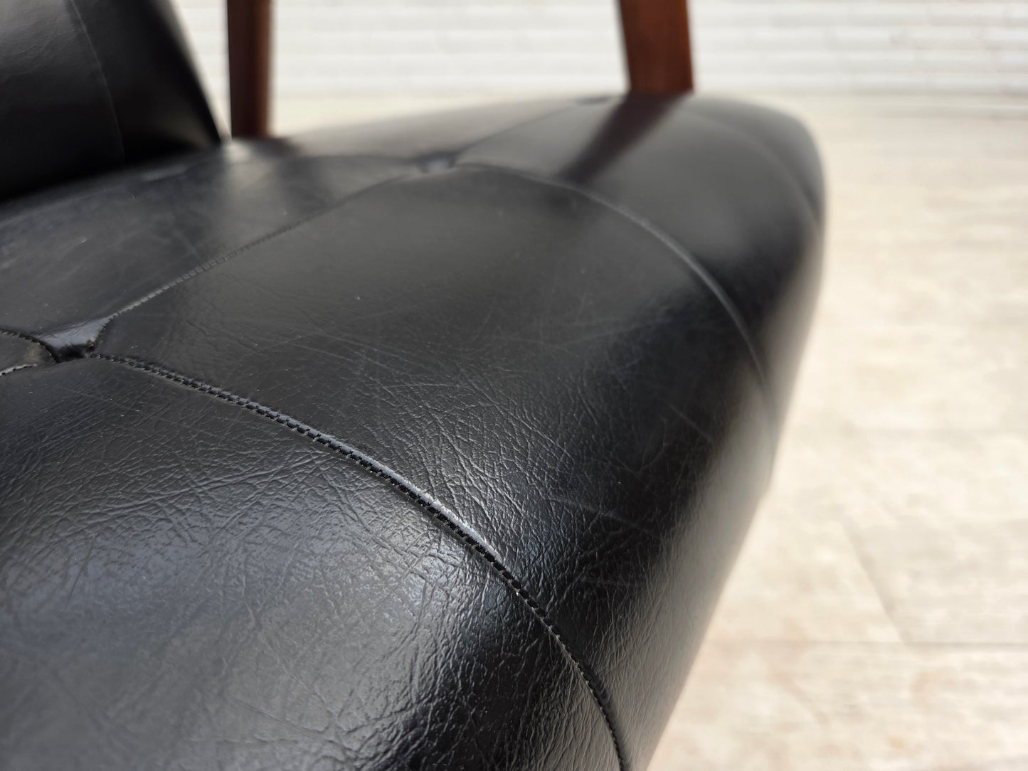 1970s, Danish armchair, black artificial leather, teak wood.