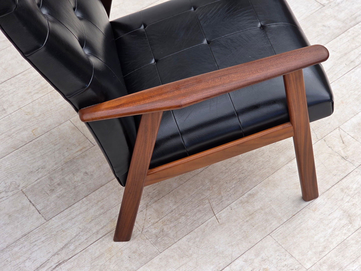 1970s, Danish armchair, black artificial leather, teak wood.
