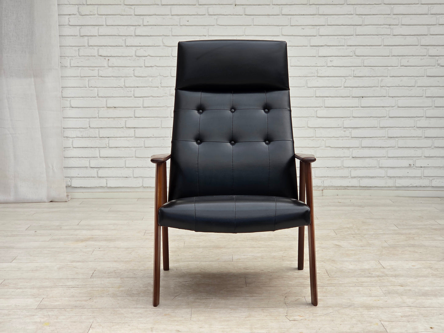 1970s, Danish armchair, black artificial leather, teak wood.