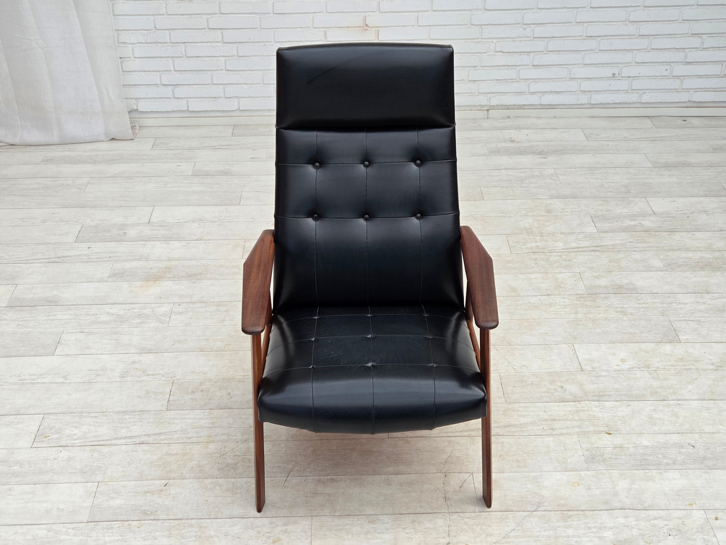 1970s, Danish armchair, black artificial leather, teak wood.
