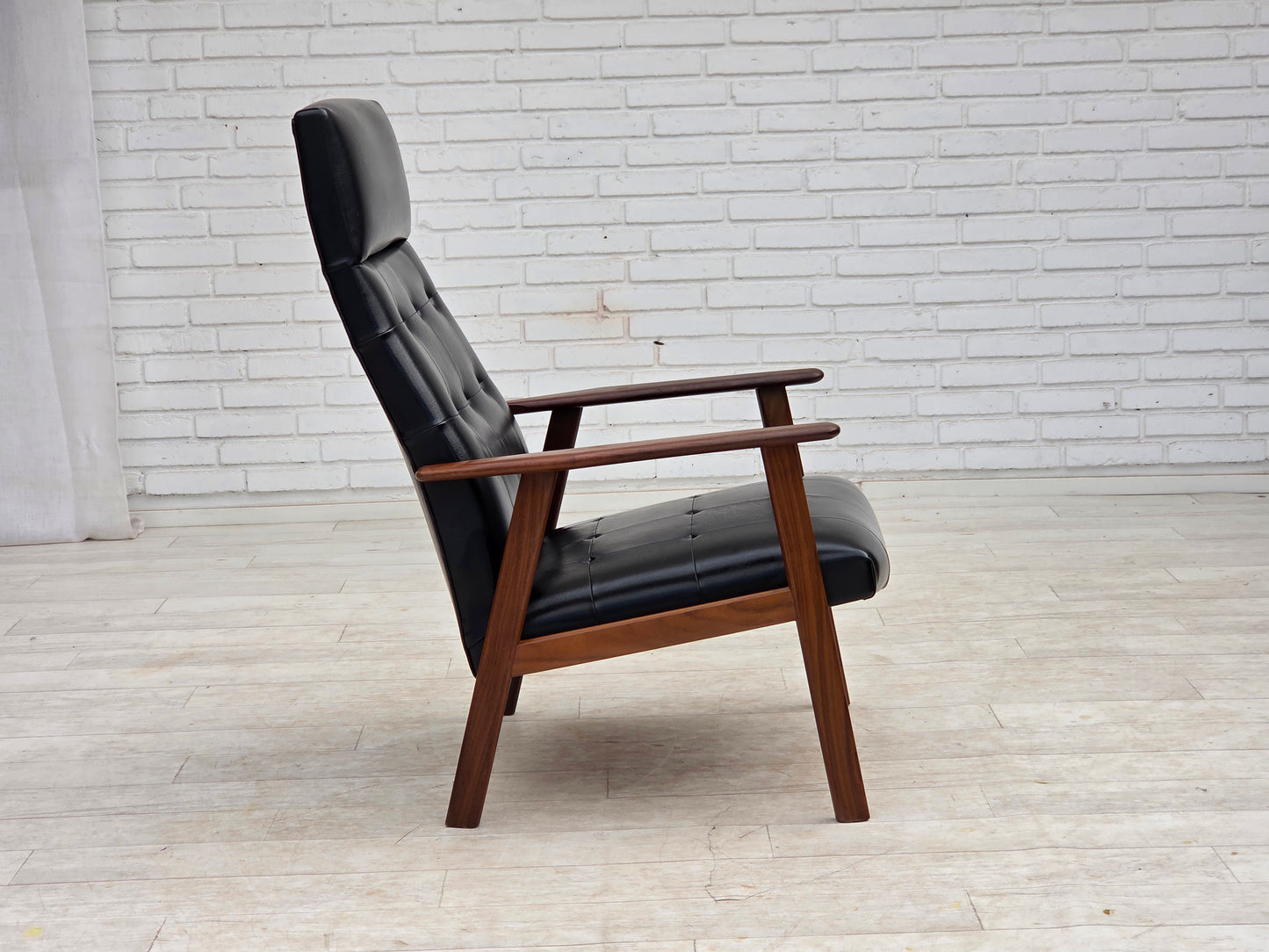 1970s, Danish armchair, black artificial leather, teak wood.