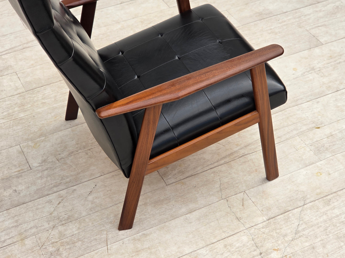 1970s, Danish armchair, black artificial leather, teak wood.