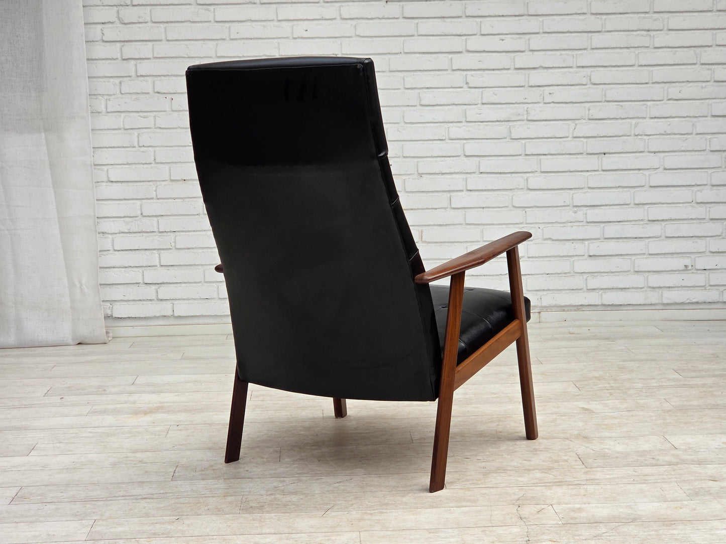 1970s, Danish armchair, black artificial leather, teak wood.