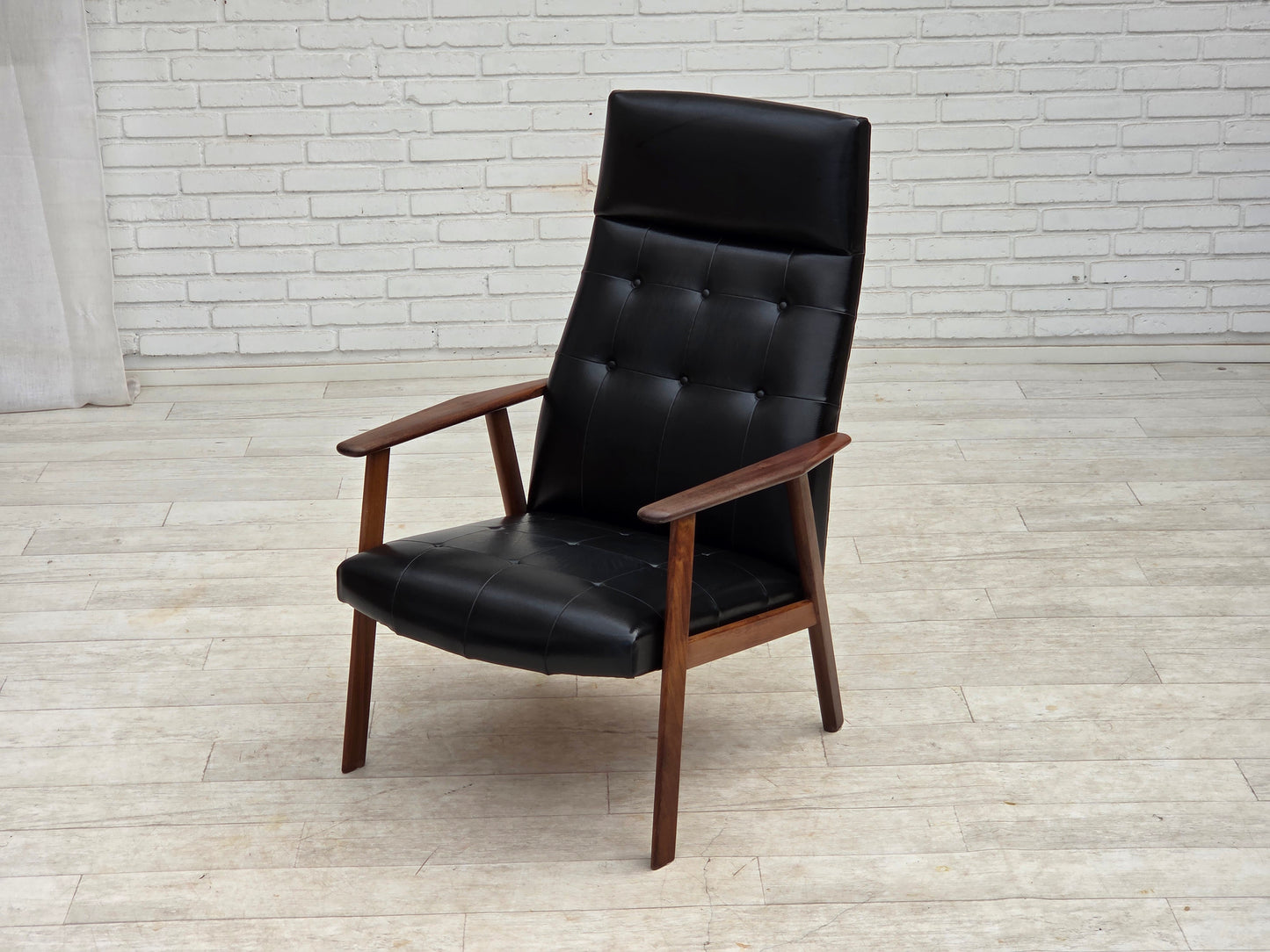 1970s, Danish armchair, black artificial leather, teak wood.