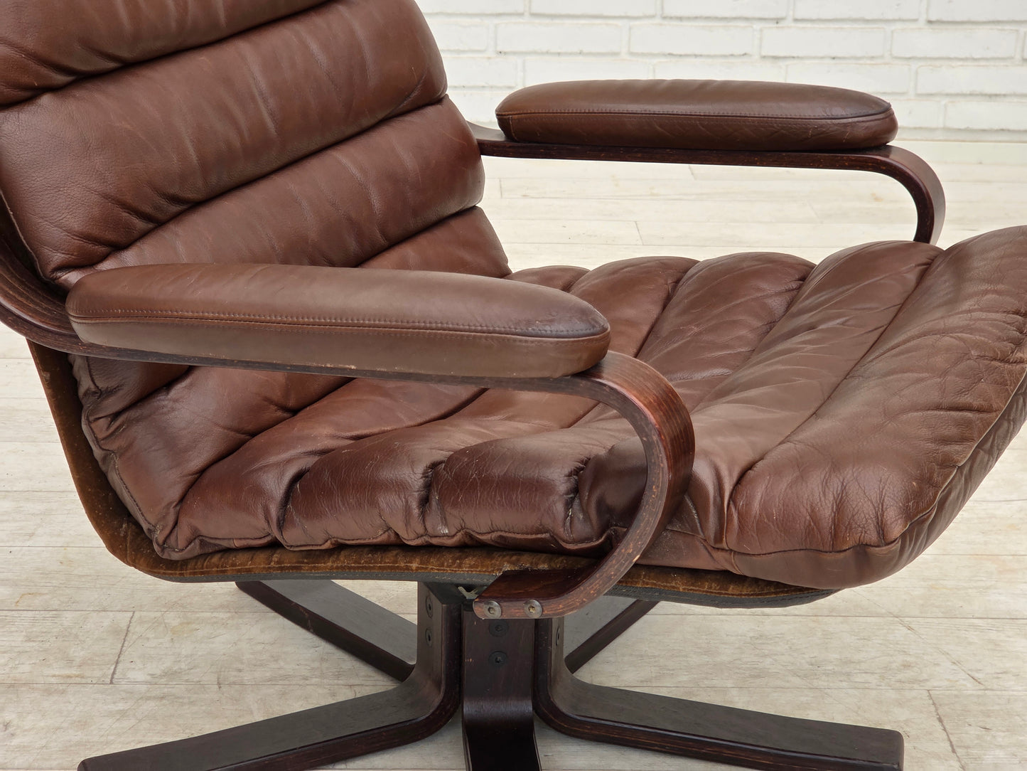 1970s, Danish swivel armchair by Georg Thams, brown furniture leather.