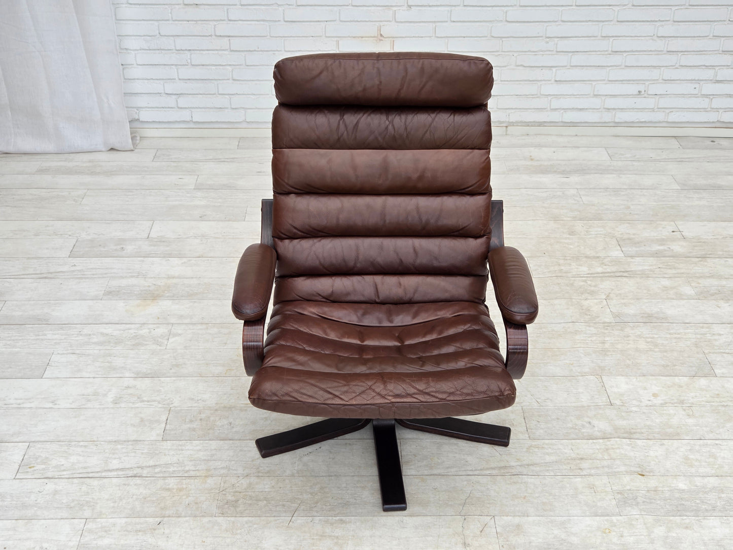 1970s, Danish swivel armchair by Georg Thams, brown furniture leather.