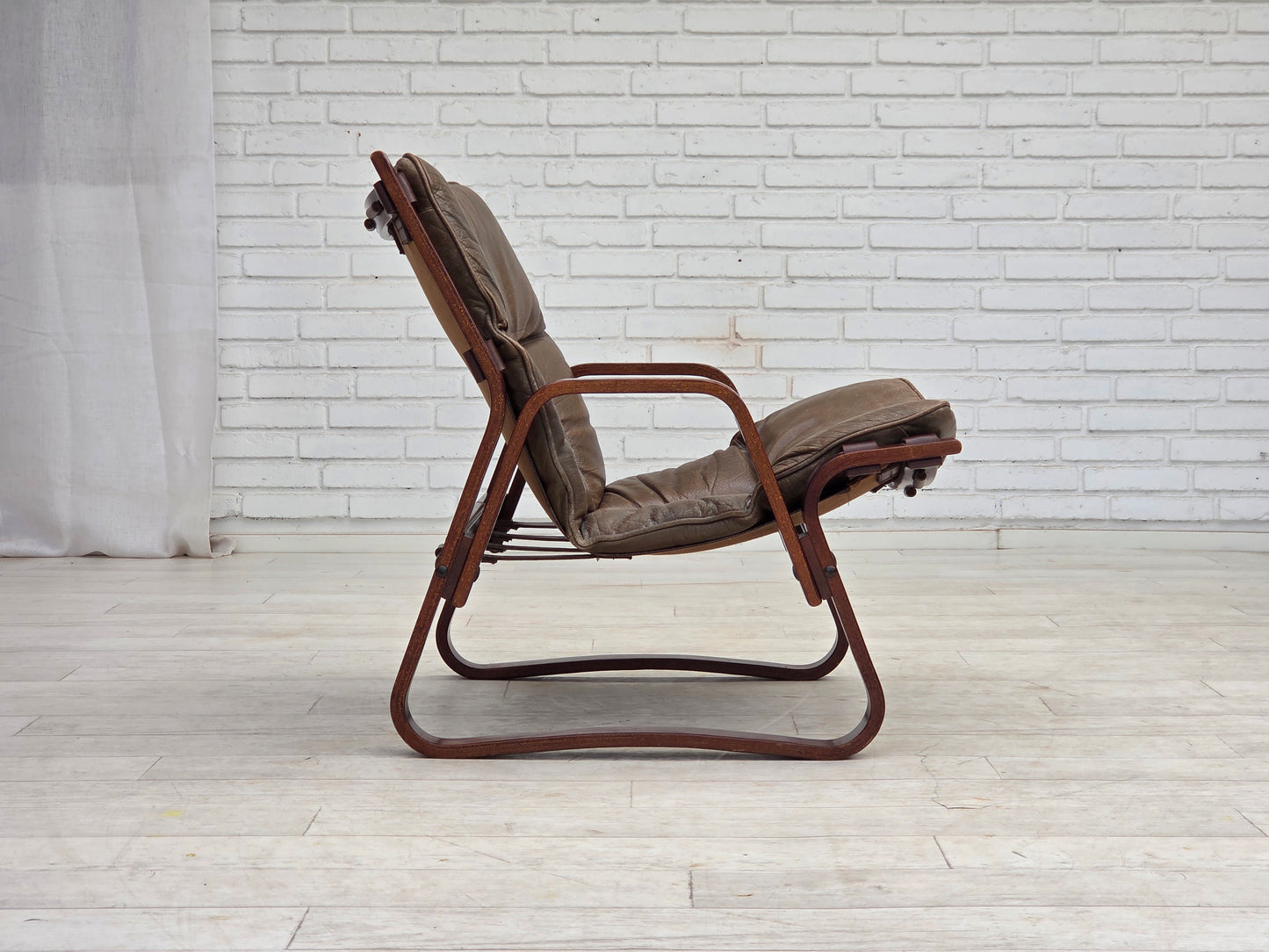 1970s, Norwegian lounge chair, furniture leather, bent wood.