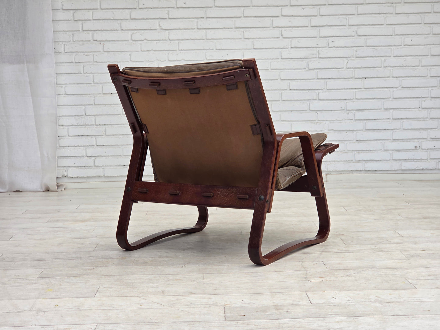 1970s, Norwegian lounge chair, furniture leather, bent wood.