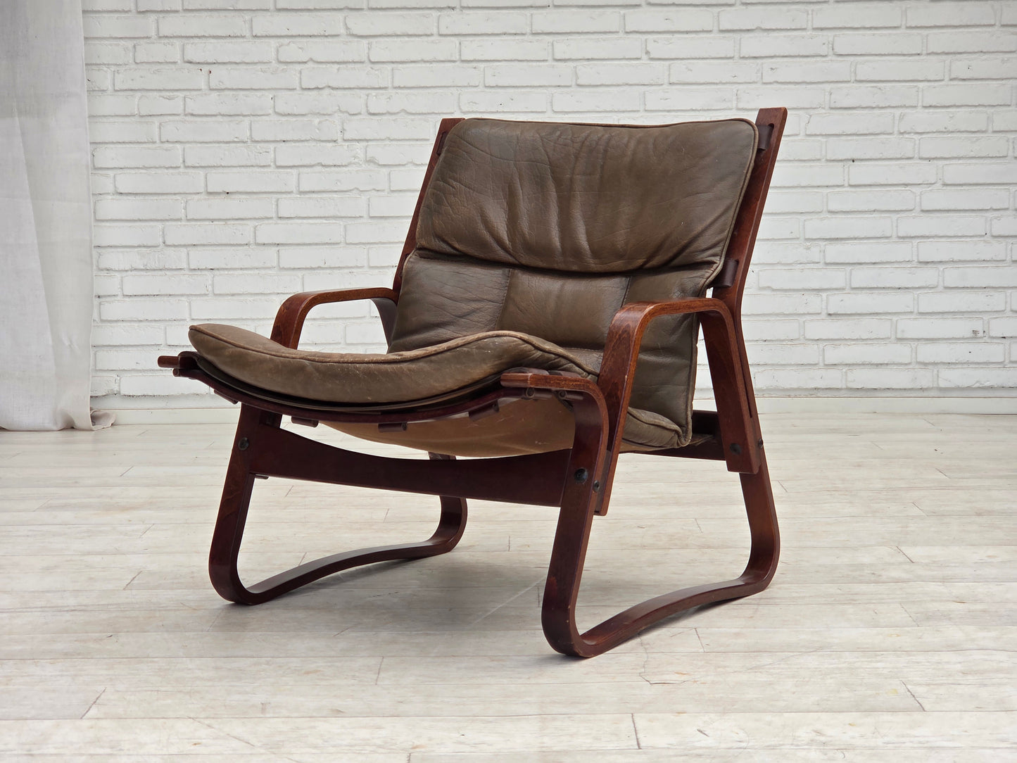 1970s, Norwegian lounge chair, furniture leather, bent wood.